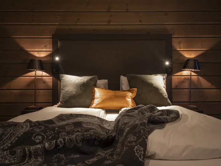 Innvendig på et soverom på lodgen-apartments.