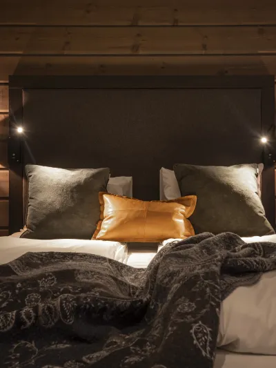 Innvendig på et soverom på lodgen-apartments.