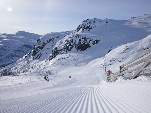 NY preppede skibakker, og glade skikjørere.